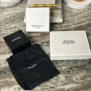 Chanel, Alexander McQueen, YSL, Saint Laurent gift boxes and dust bag
